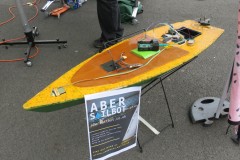 Aber Sail Bot Challenge Boat at BeachLab:relocated 2021 in Aberystwyth